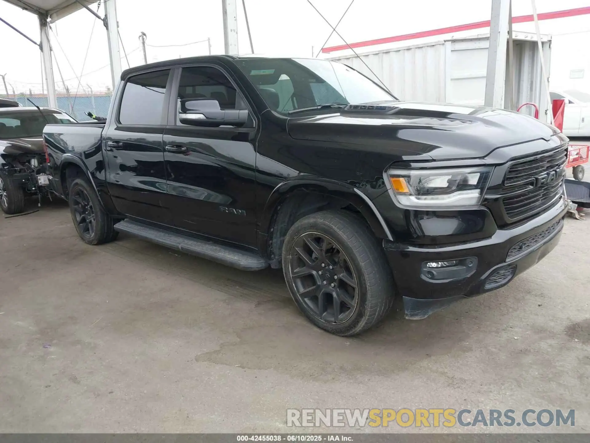 1 Photograph of a damaged car 1C6SRFJT9MN542322 RAM 1500 2021