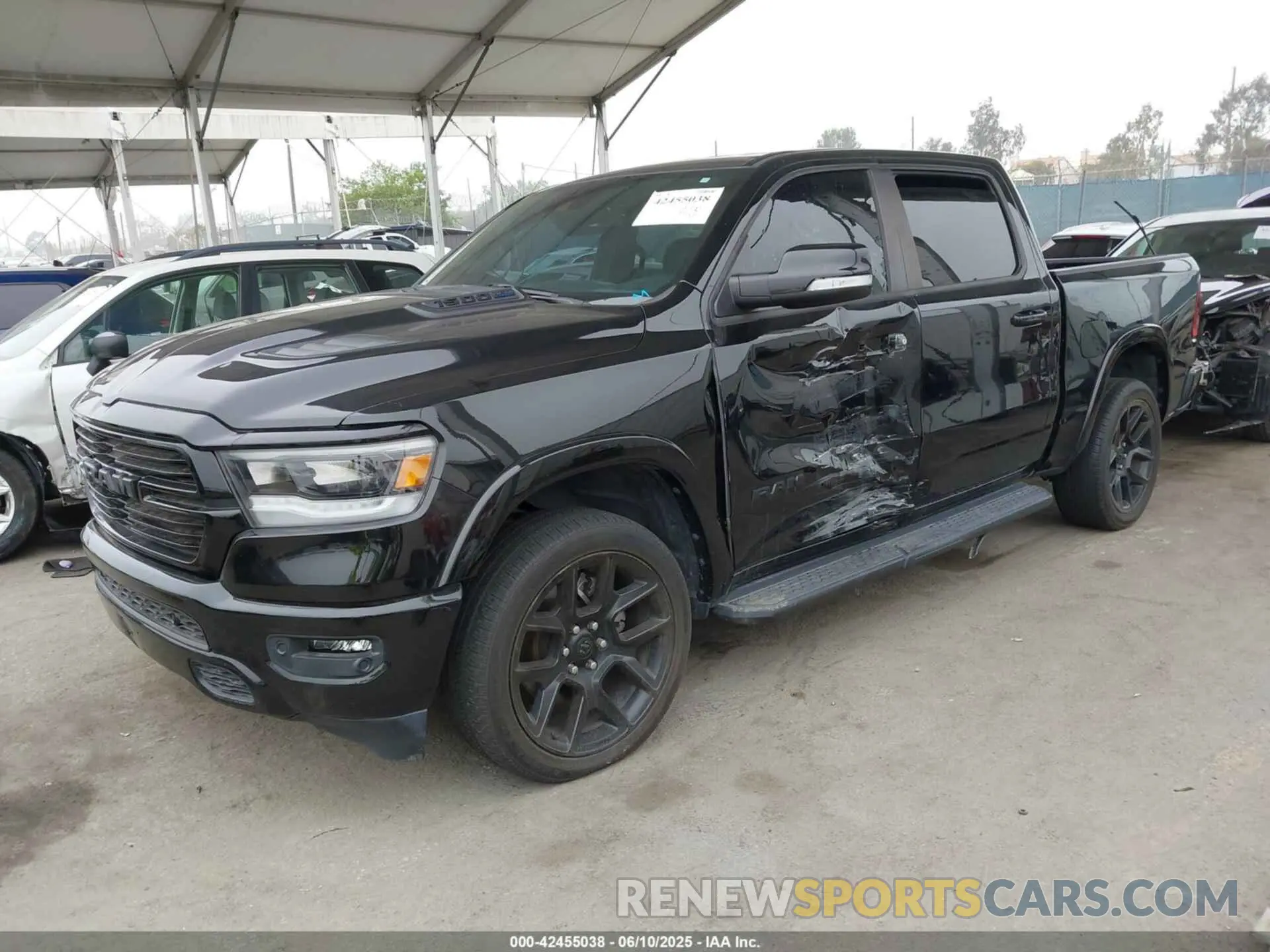 2 Photograph of a damaged car 1C6SRFJT9MN542322 RAM 1500 2021
