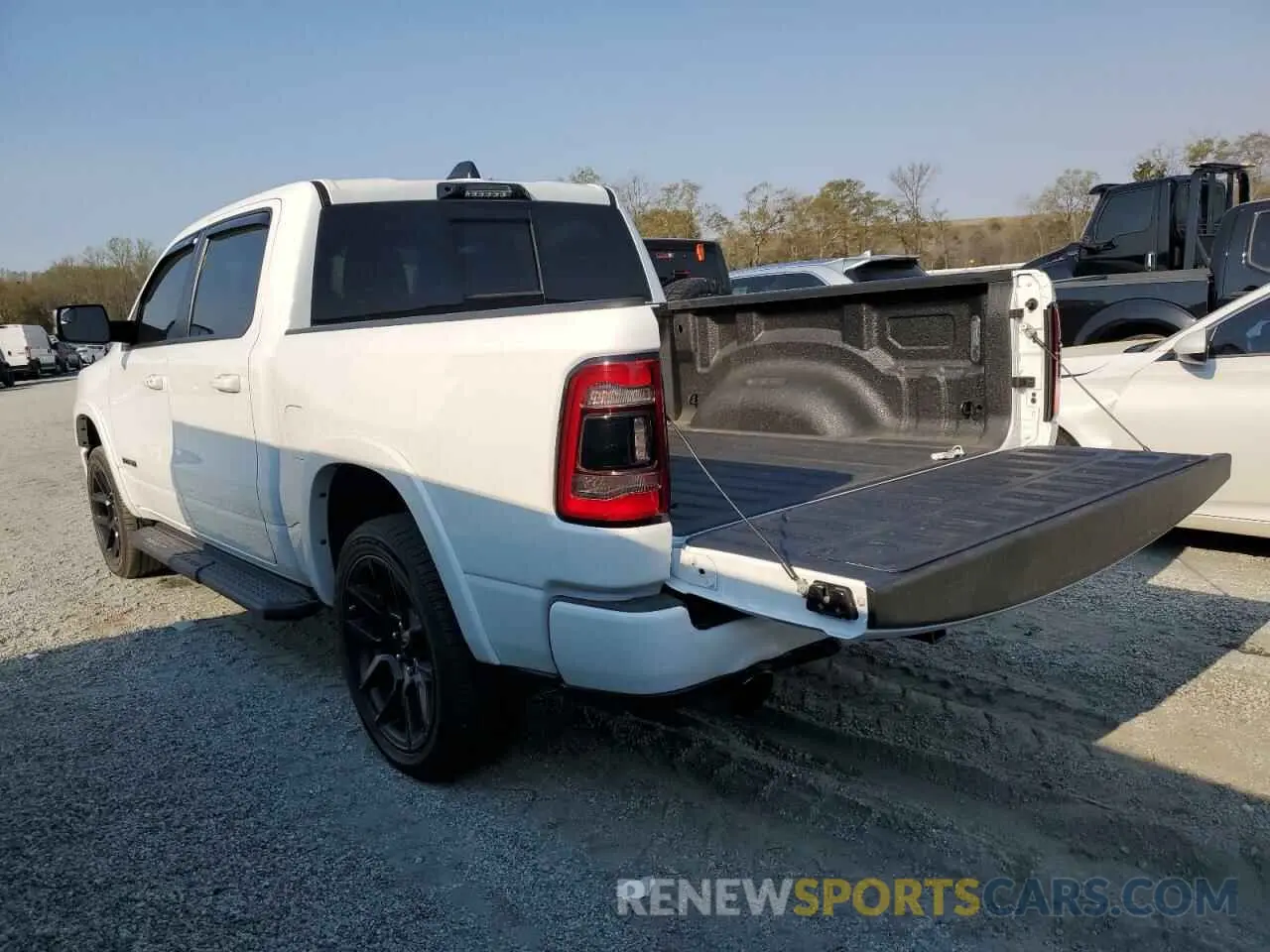 2 Photograph of a damaged car 1C6SRFJT9MN621022 RAM 1500 2021