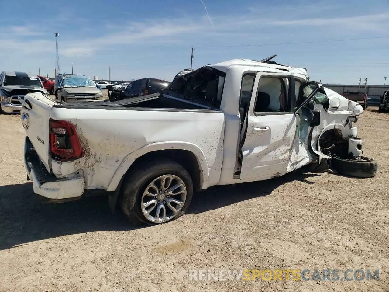 3 Photograph of a damaged car 1C6SRFJT9MN642999 RAM 1500 2021
