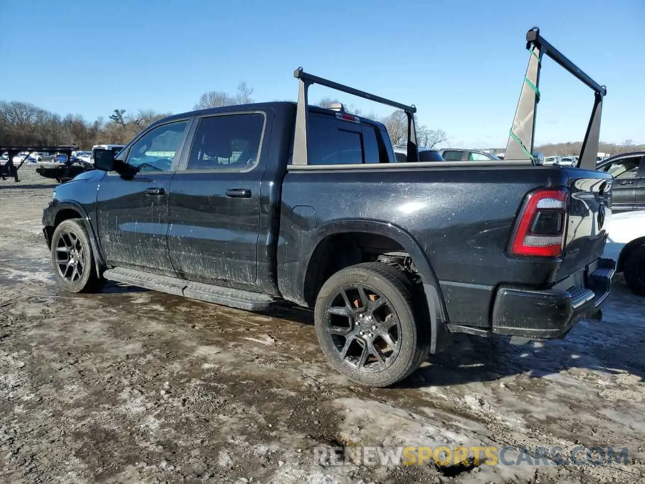 2 Photograph of a damaged car 1C6SRFJTXMN577760 RAM 1500 2021