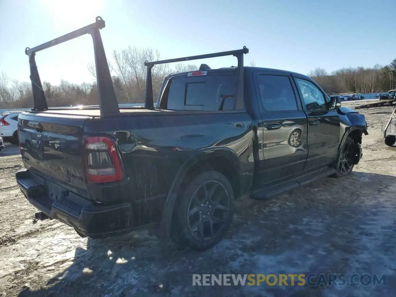 3 Photograph of a damaged car 1C6SRFJTXMN577760 RAM 1500 2021