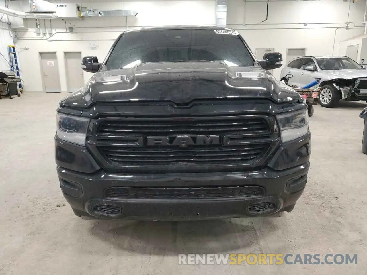 5 Photograph of a damaged car 1C6SRFJTXMN634443 RAM 1500 2021