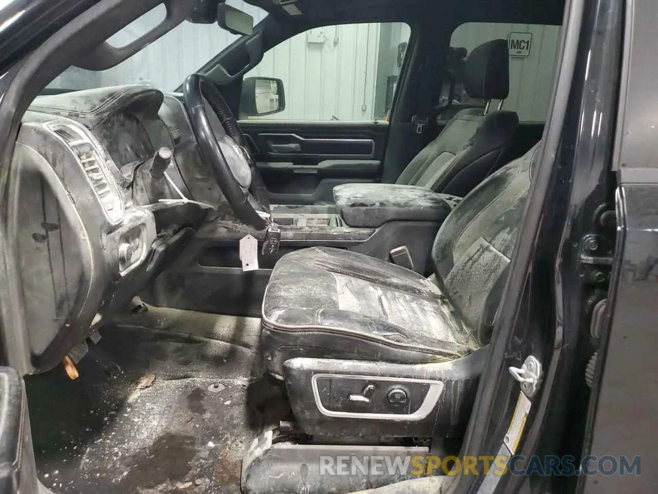 7 Photograph of a damaged car 1C6SRFJTXMN634443 RAM 1500 2021