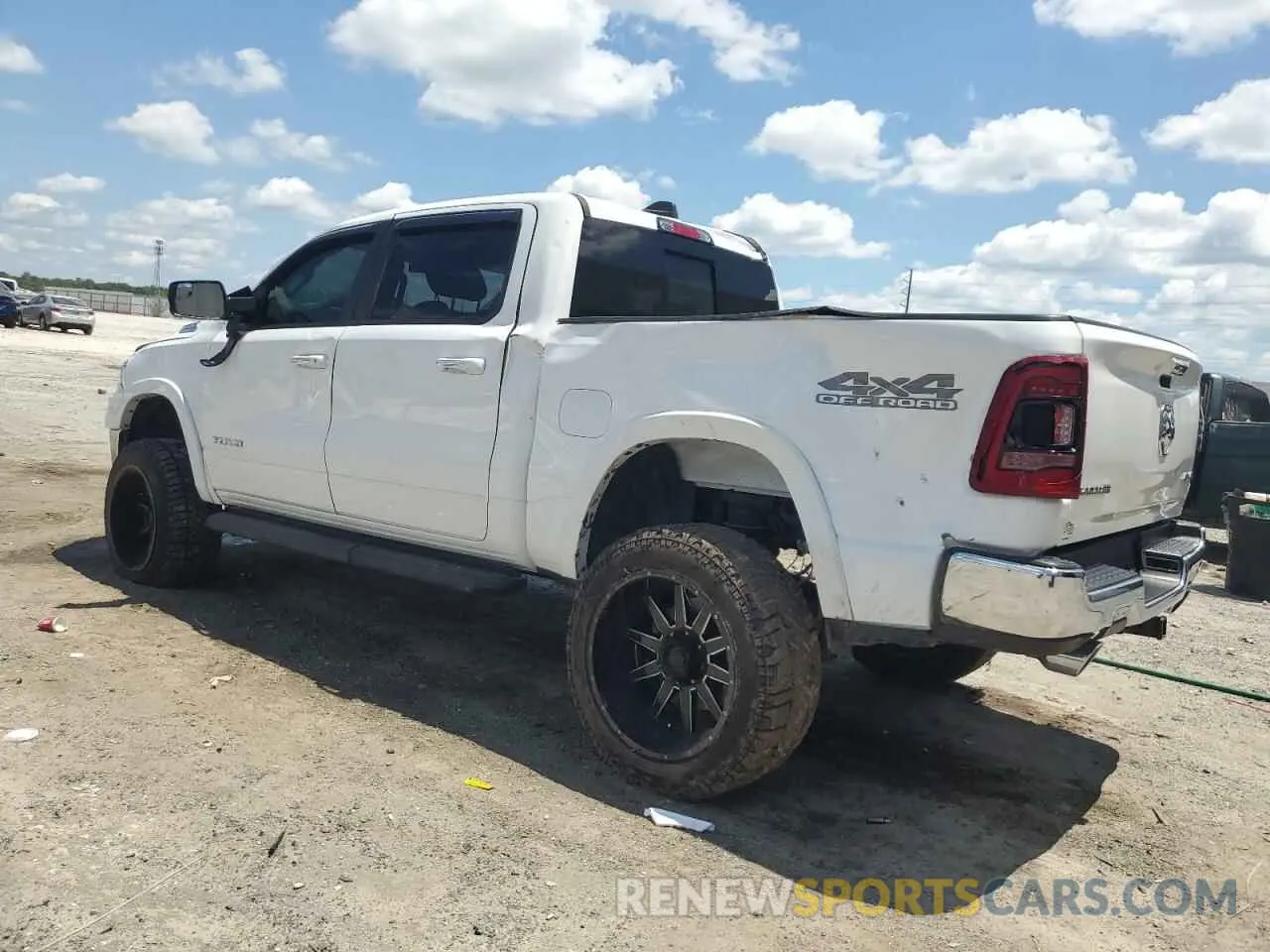 2 Photograph of a damaged car 1C6SRFJTXMN719184 RAM 1500 2021