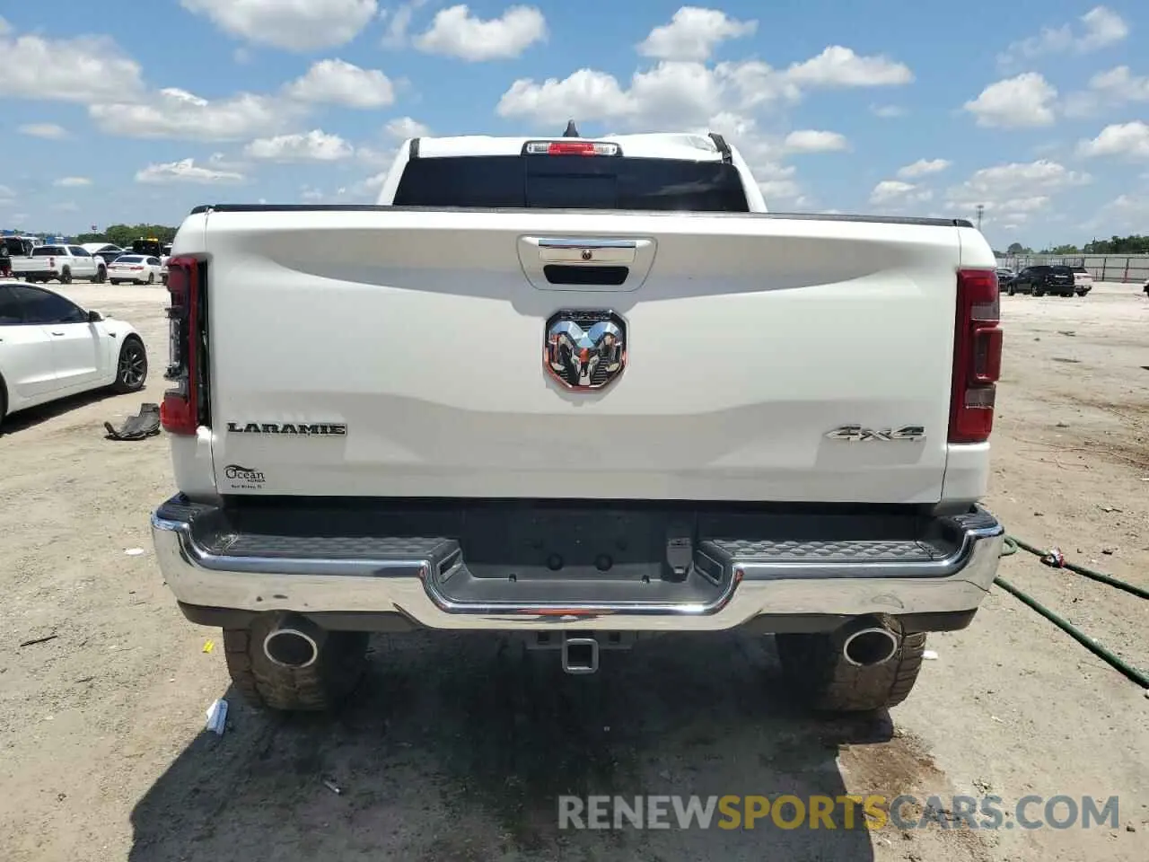 6 Photograph of a damaged car 1C6SRFJTXMN719184 RAM 1500 2021