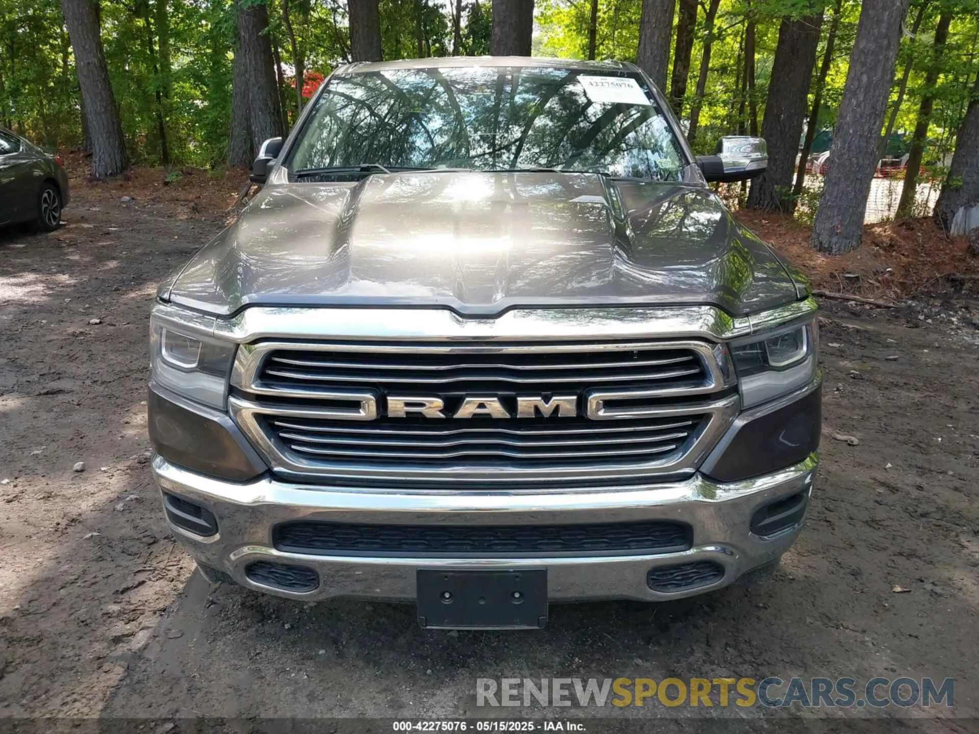 12 Photograph of a damaged car 1C6SRFJTXMN734090 RAM 1500 2021