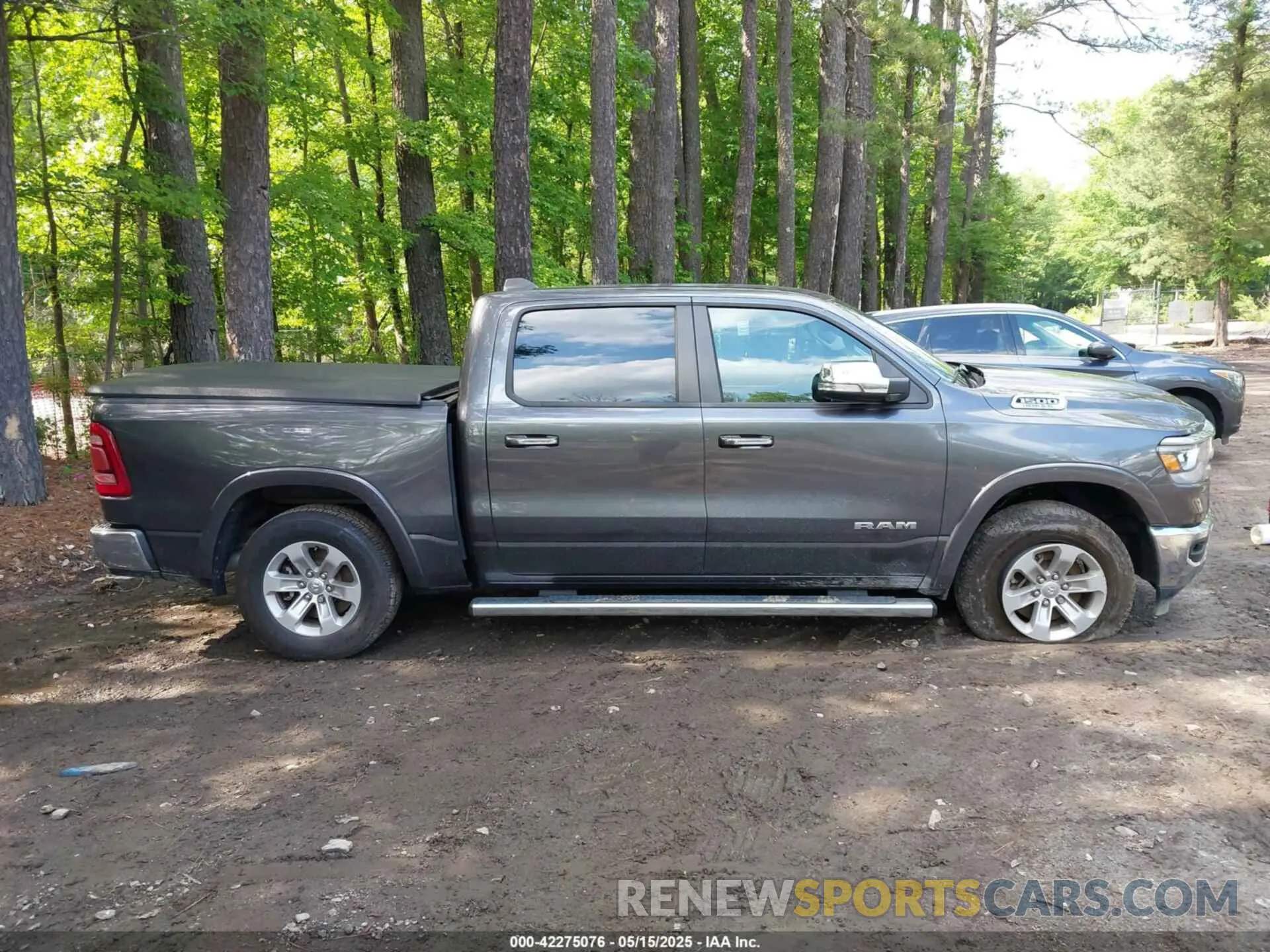 13 Photograph of a damaged car 1C6SRFJTXMN734090 RAM 1500 2021
