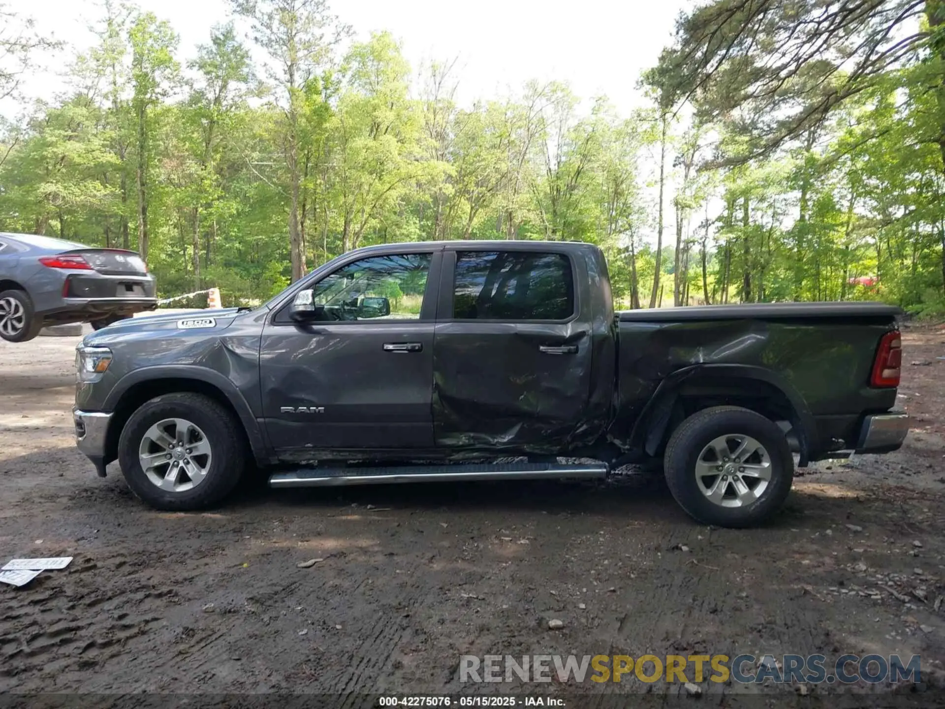 14 Photograph of a damaged car 1C6SRFJTXMN734090 RAM 1500 2021