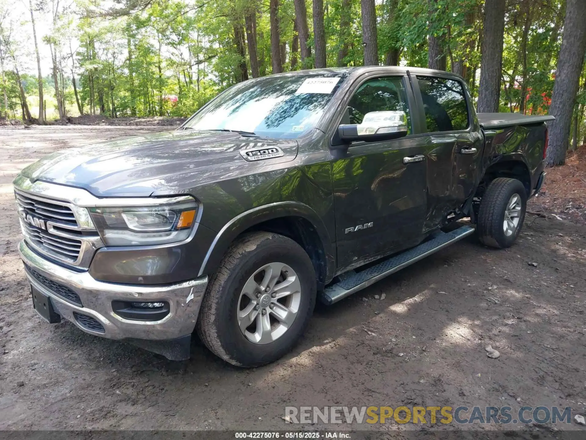 2 Photograph of a damaged car 1C6SRFJTXMN734090 RAM 1500 2021