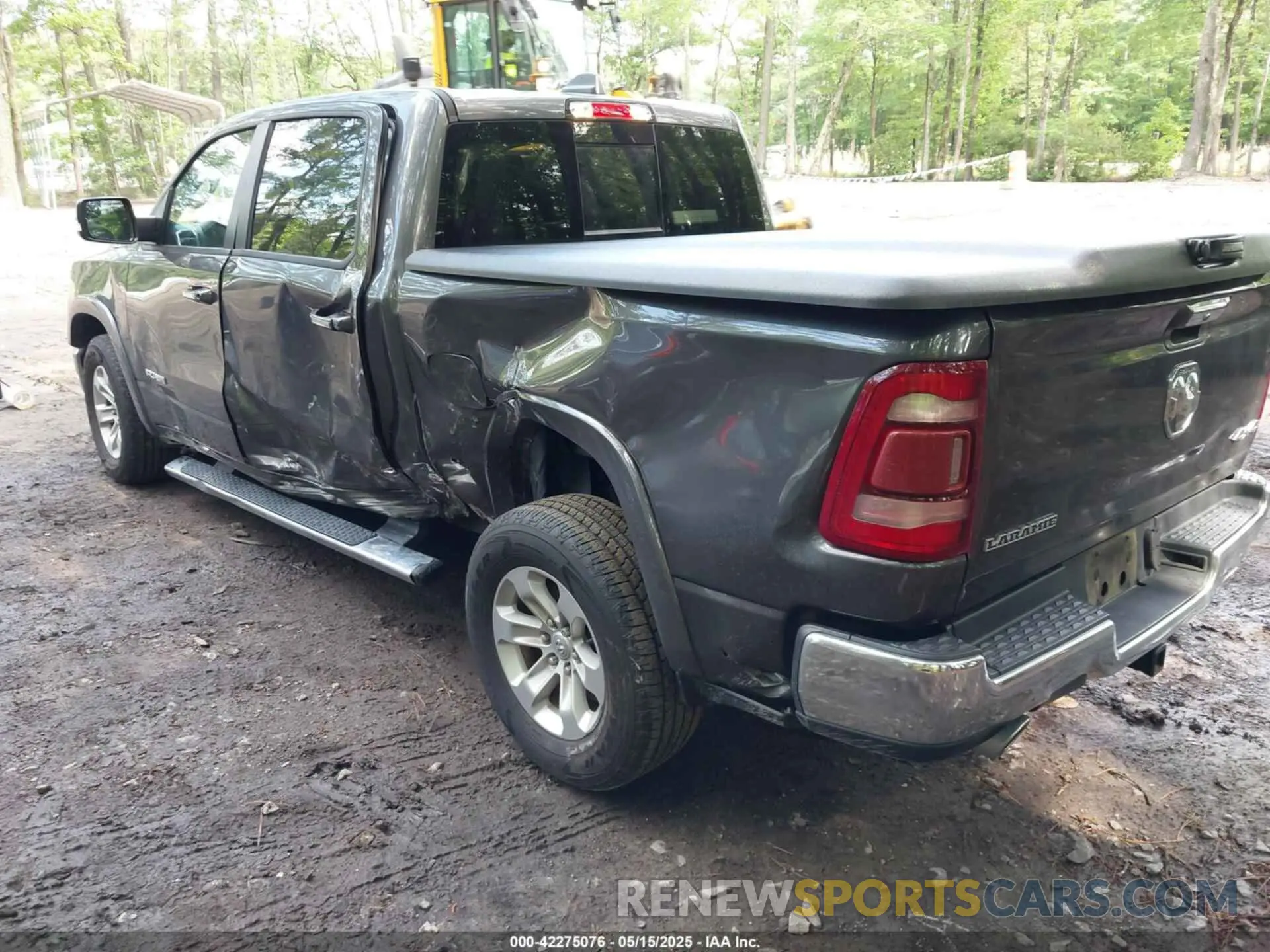 3 Photograph of a damaged car 1C6SRFJTXMN734090 RAM 1500 2021