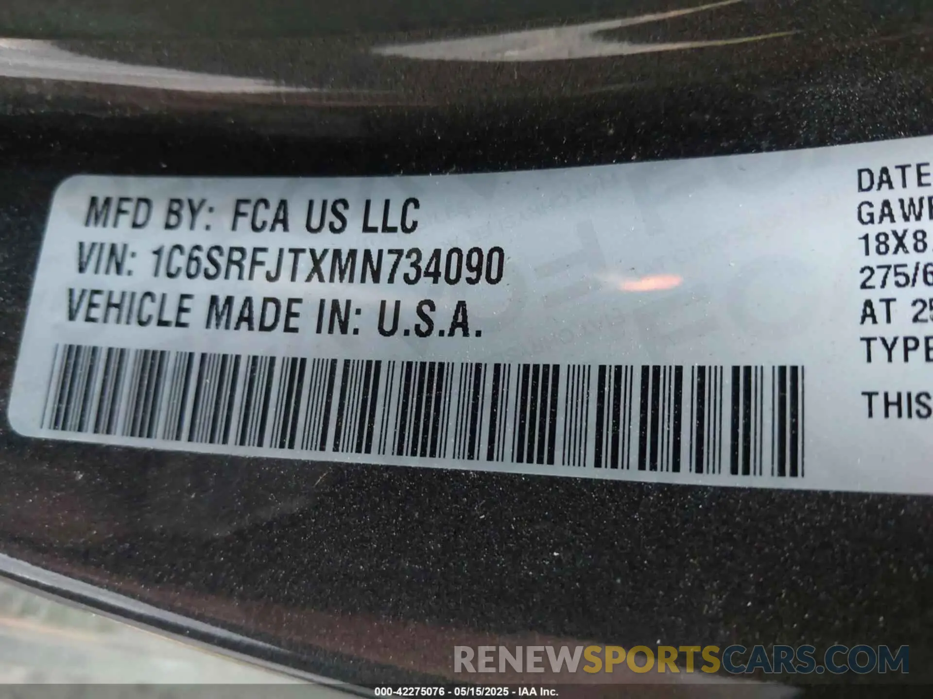 9 Photograph of a damaged car 1C6SRFJTXMN734090 RAM 1500 2021