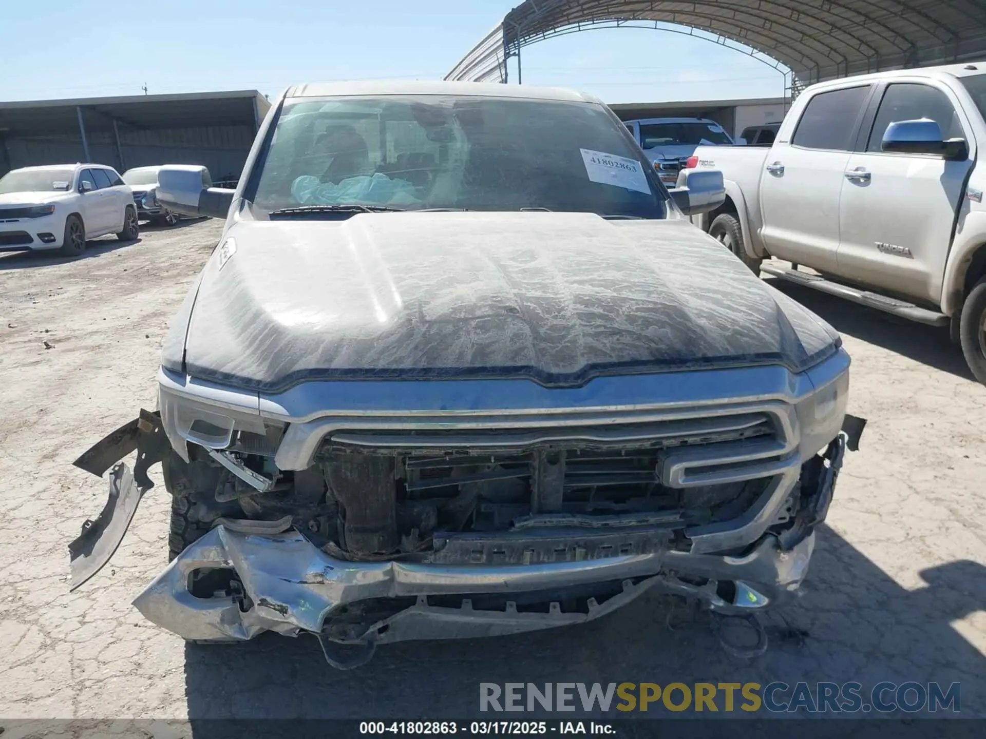 13 Photograph of a damaged car 1C6SRFJTXMN751178 RAM 1500 2021