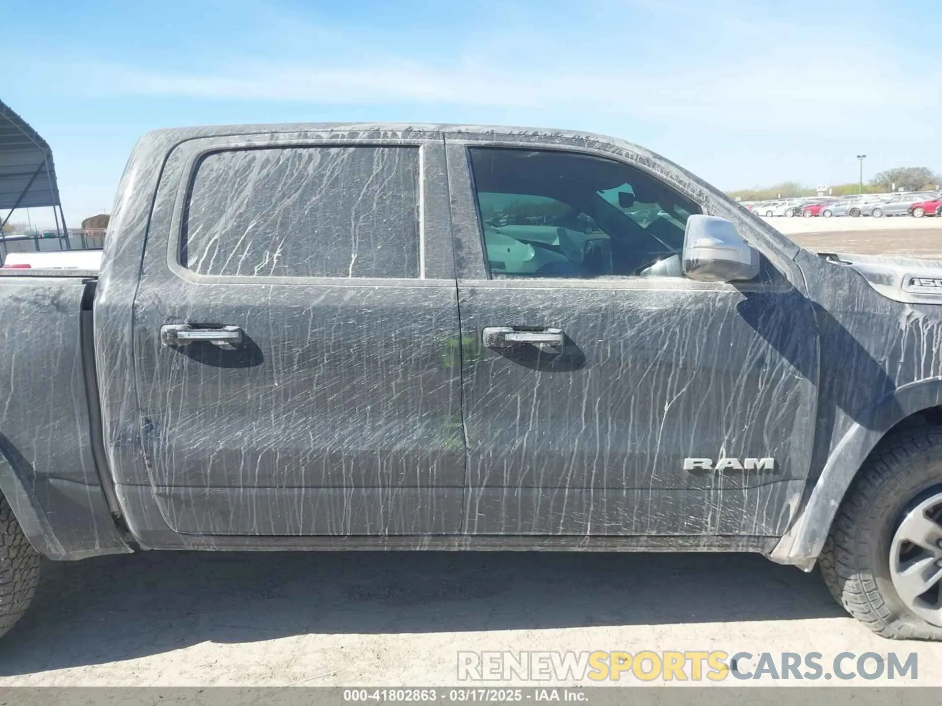 14 Photograph of a damaged car 1C6SRFJTXMN751178 RAM 1500 2021