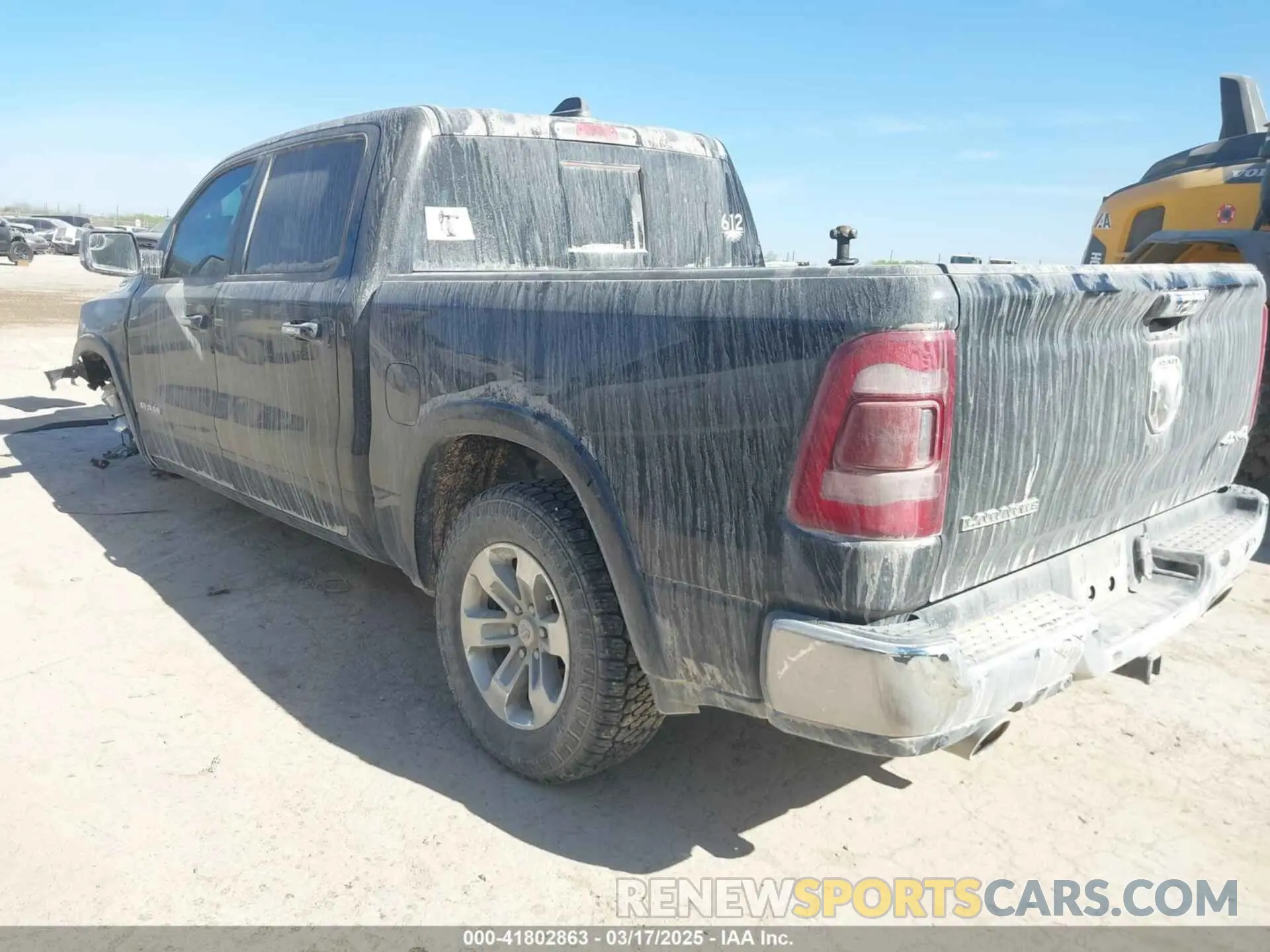 3 Photograph of a damaged car 1C6SRFJTXMN751178 RAM 1500 2021