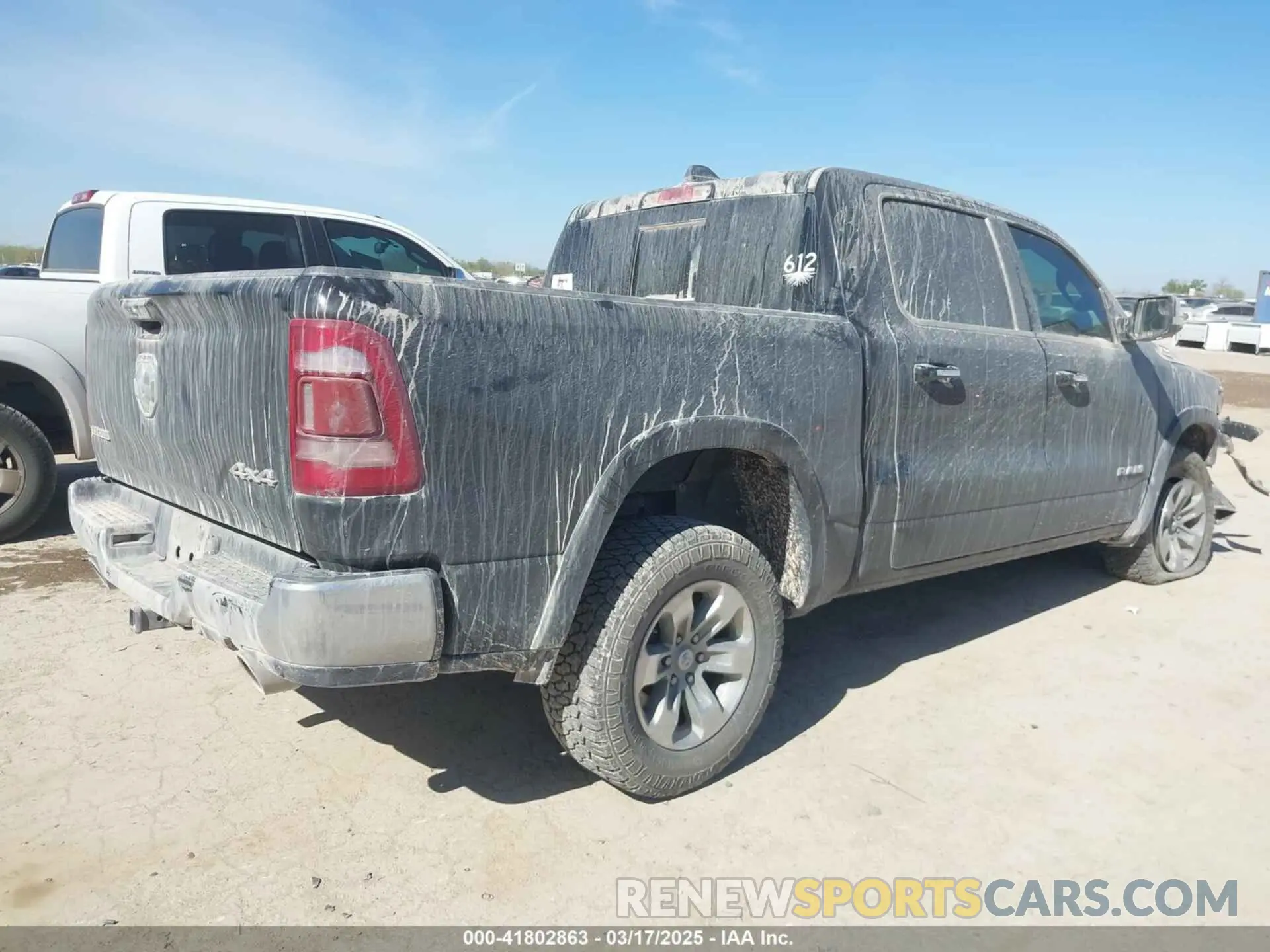 4 Photograph of a damaged car 1C6SRFJTXMN751178 RAM 1500 2021