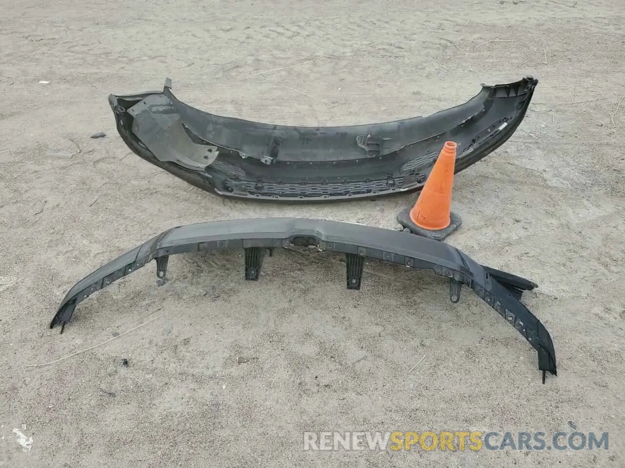12 Photograph of a damaged car 1C6SRFJTXMN799294 RAM 1500 2021