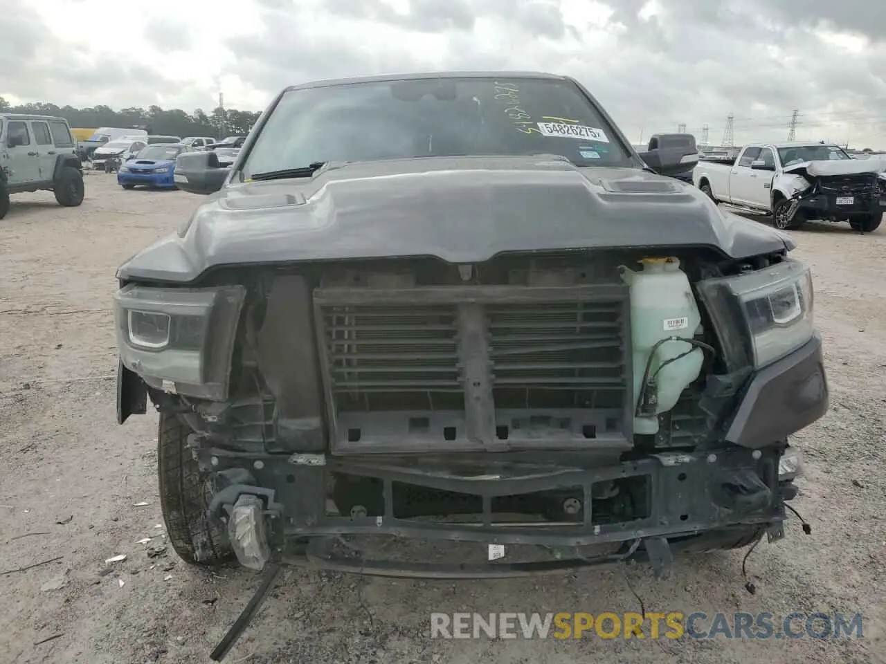 5 Photograph of a damaged car 1C6SRFJTXMN799294 RAM 1500 2021