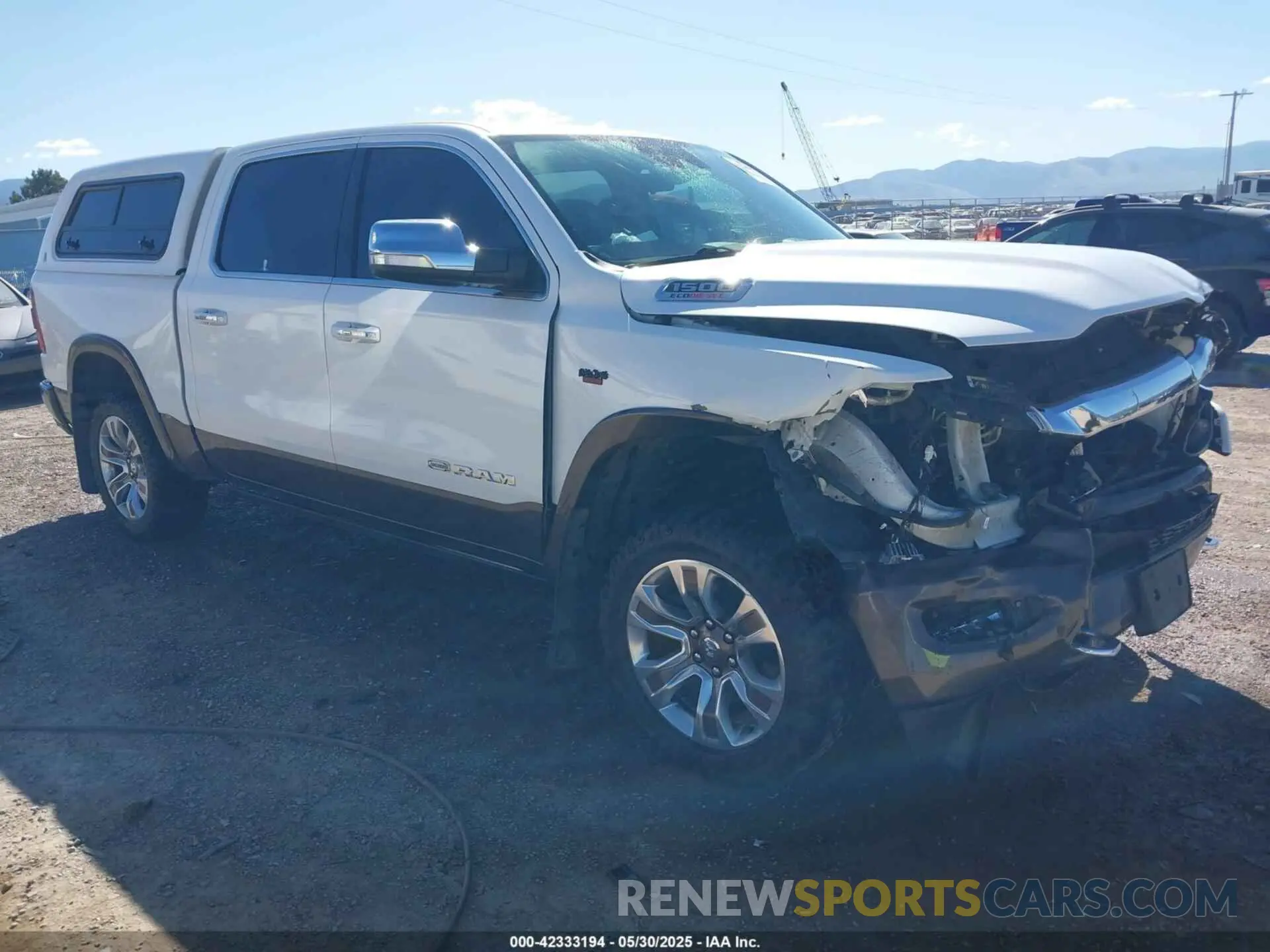 1 Photograph of a damaged car 1C6SRFKM7MN748441 RAM 1500 2021