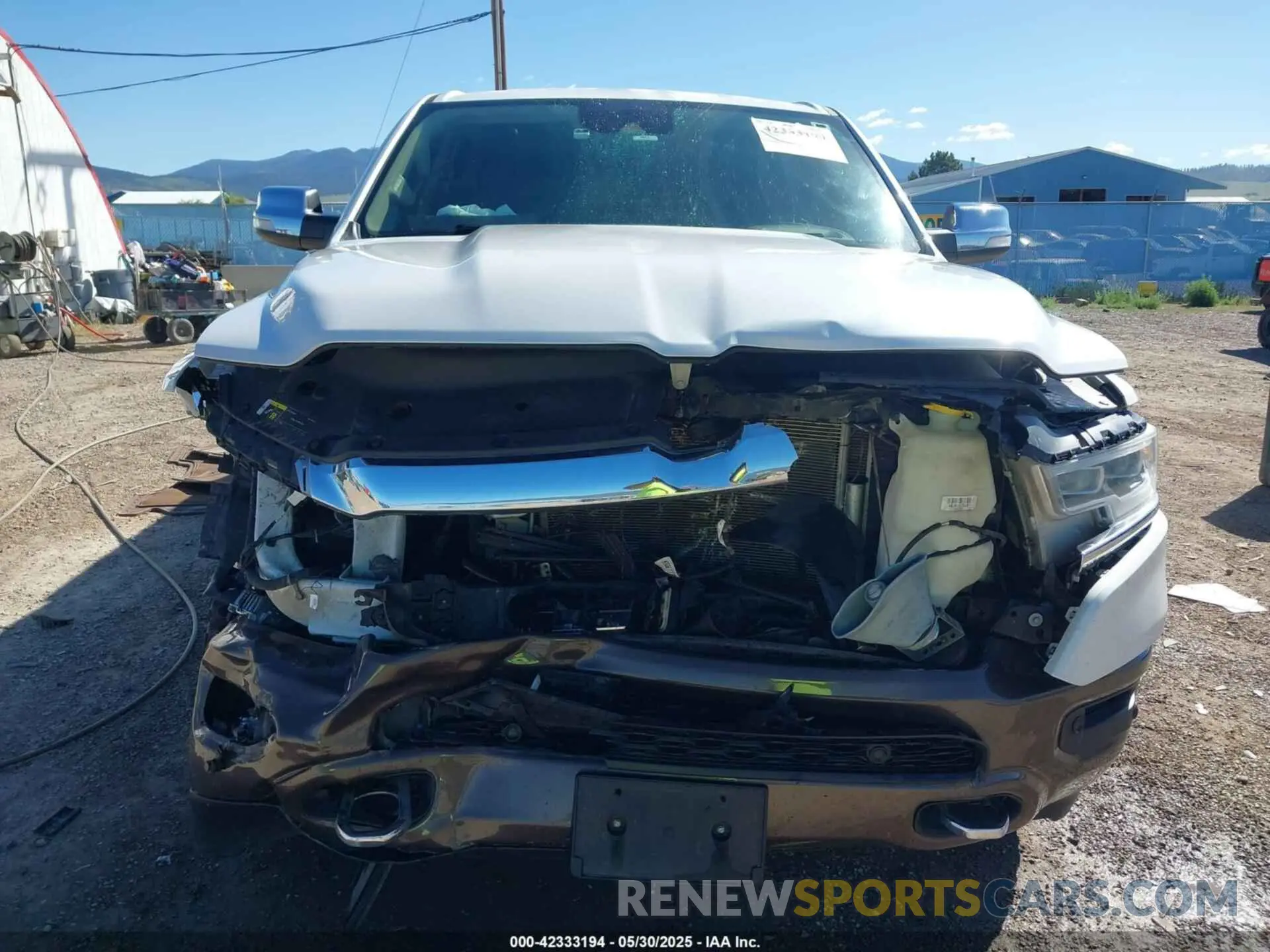 12 Photograph of a damaged car 1C6SRFKM7MN748441 RAM 1500 2021