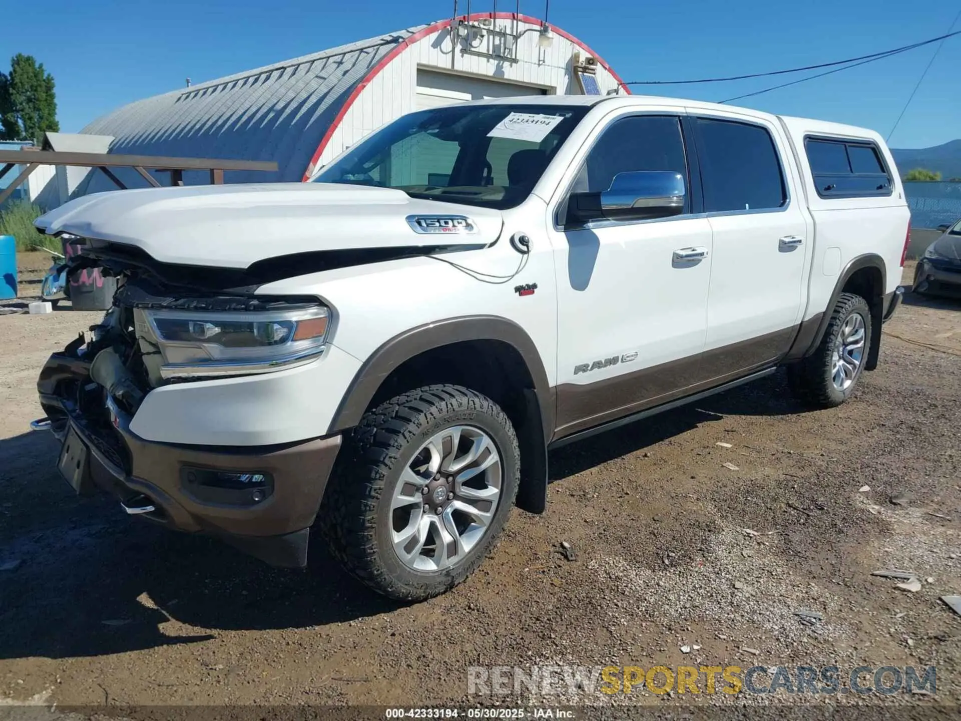 2 Photograph of a damaged car 1C6SRFKM7MN748441 RAM 1500 2021