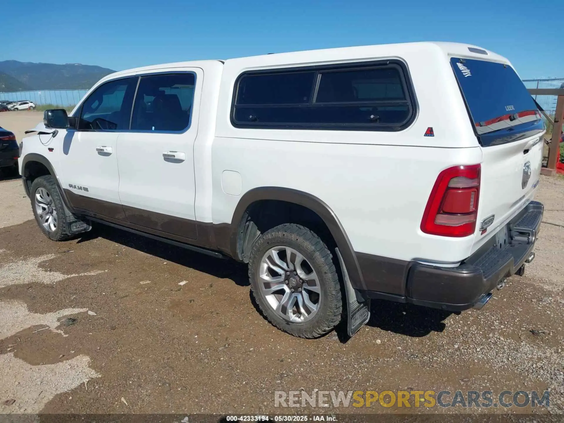 3 Photograph of a damaged car 1C6SRFKM7MN748441 RAM 1500 2021