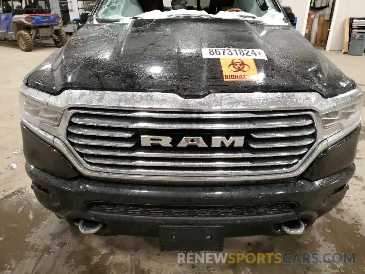 11 Photograph of a damaged car 1C6SRFKT7MN587919 RAM 1500 2021