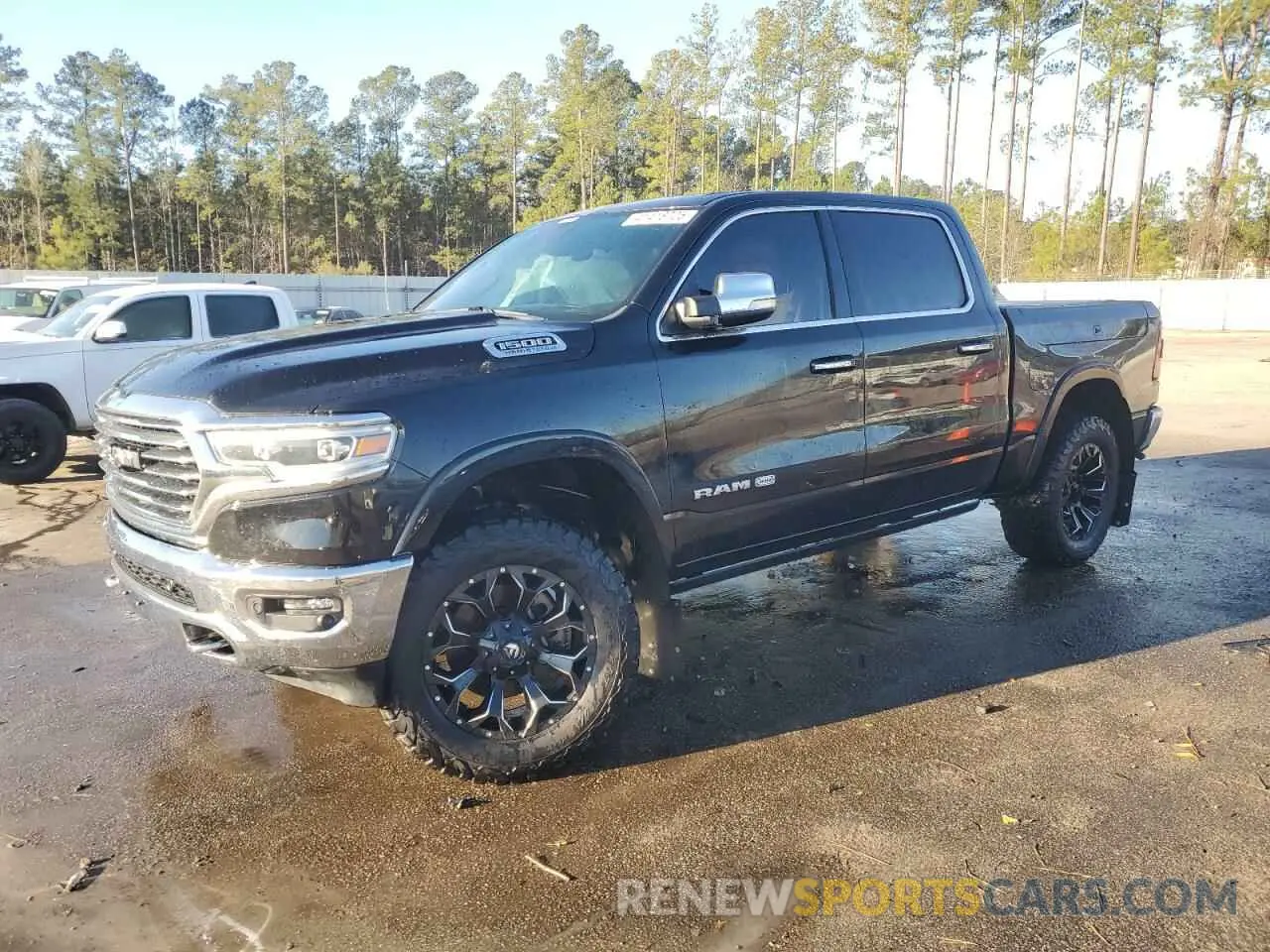 1 Photograph of a damaged car 1C6SRFKT8MN505261 RAM 1500 2021