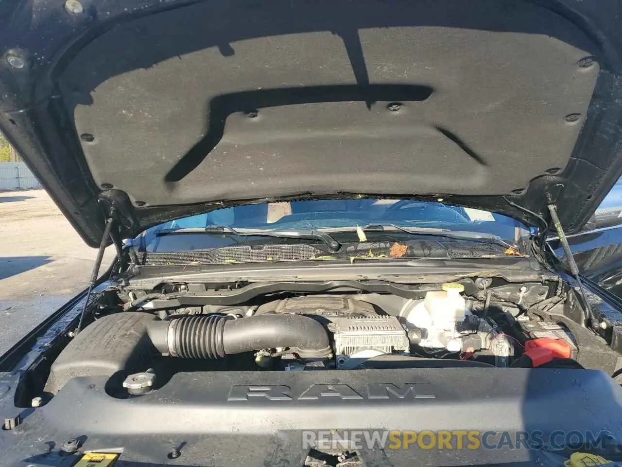 11 Photograph of a damaged car 1C6SRFKT8MN505261 RAM 1500 2021