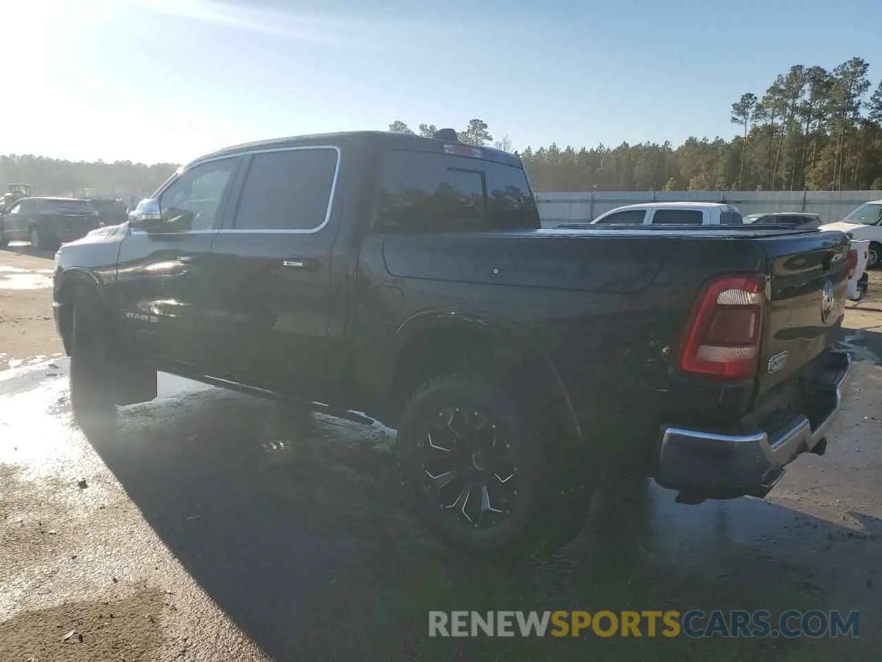 2 Photograph of a damaged car 1C6SRFKT8MN505261 RAM 1500 2021