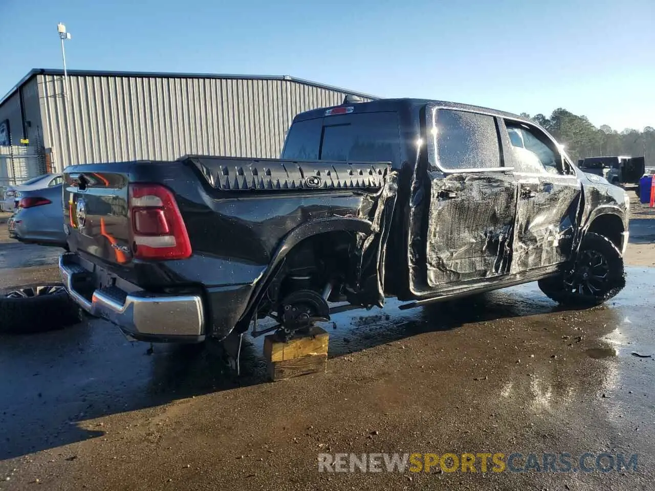 3 Photograph of a damaged car 1C6SRFKT8MN505261 RAM 1500 2021