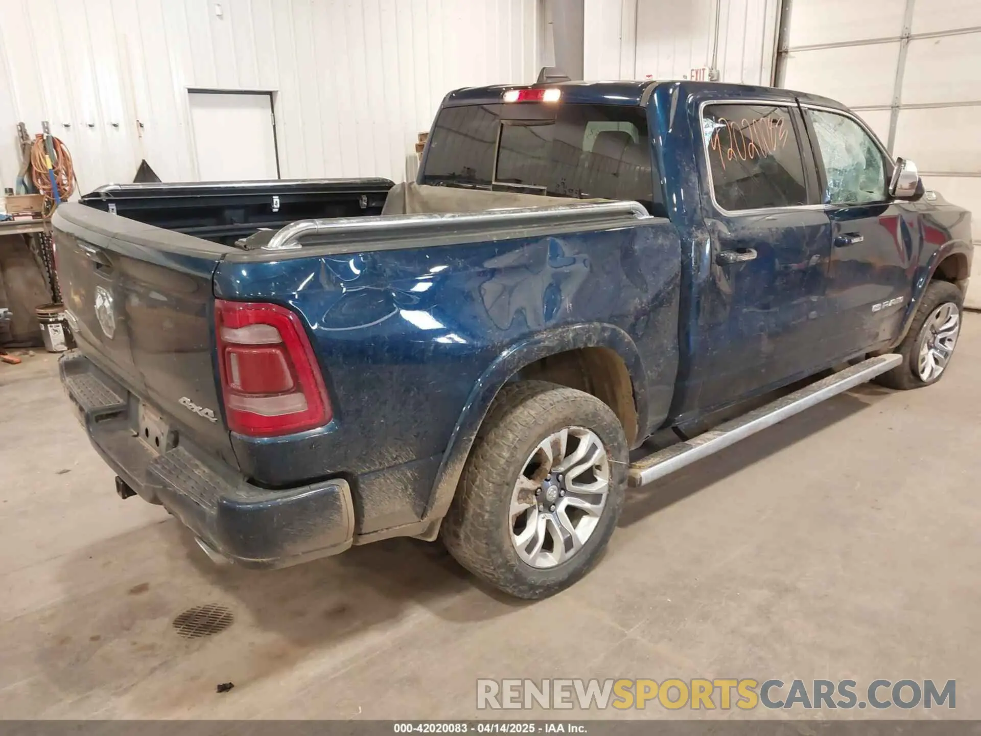 4 Photograph of a damaged car 1C6SRFKT8MN565010 RAM 1500 2021
