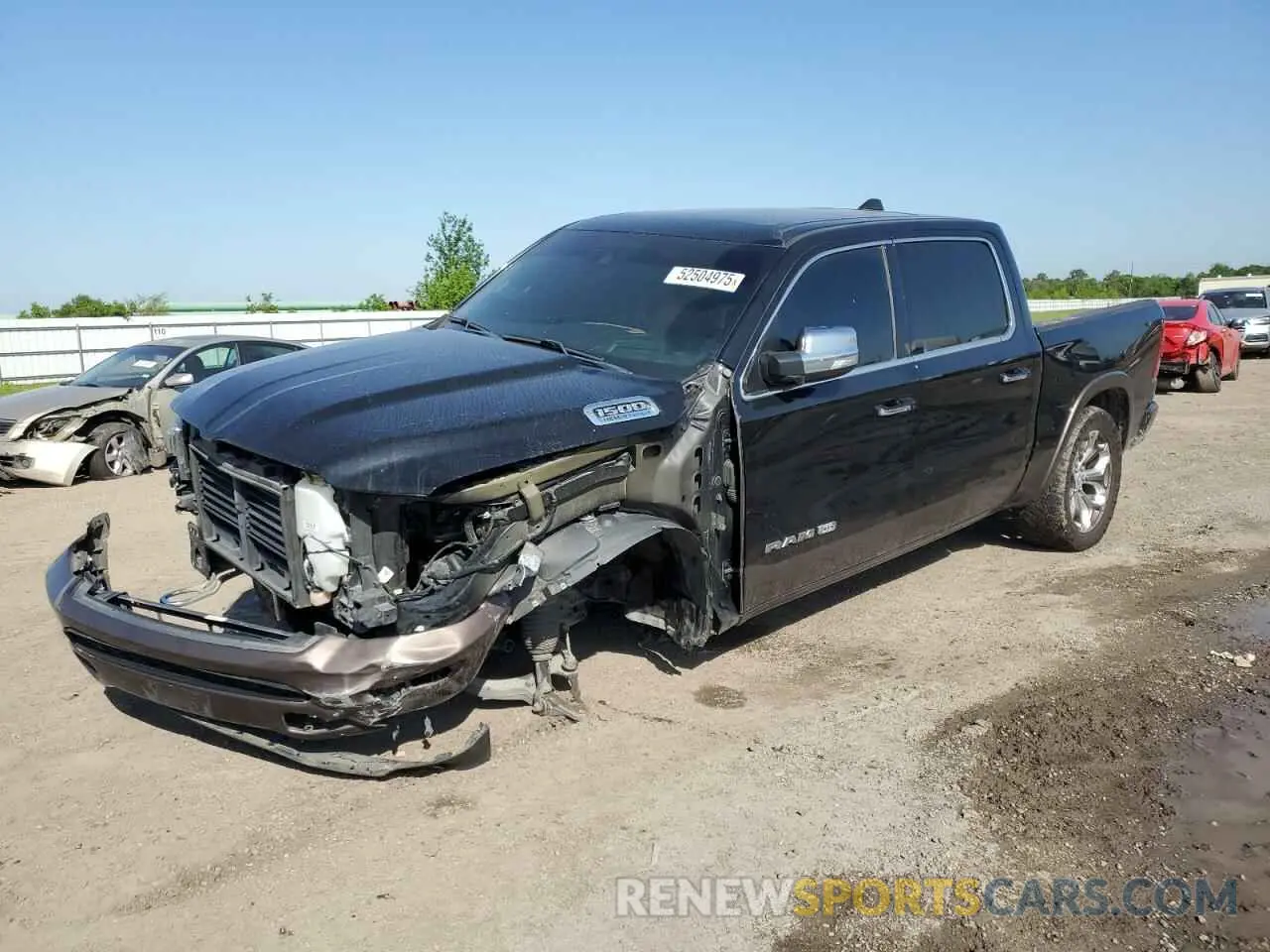 1 Photograph of a damaged car 1C6SRFKT9MN566487 RAM 1500 2021