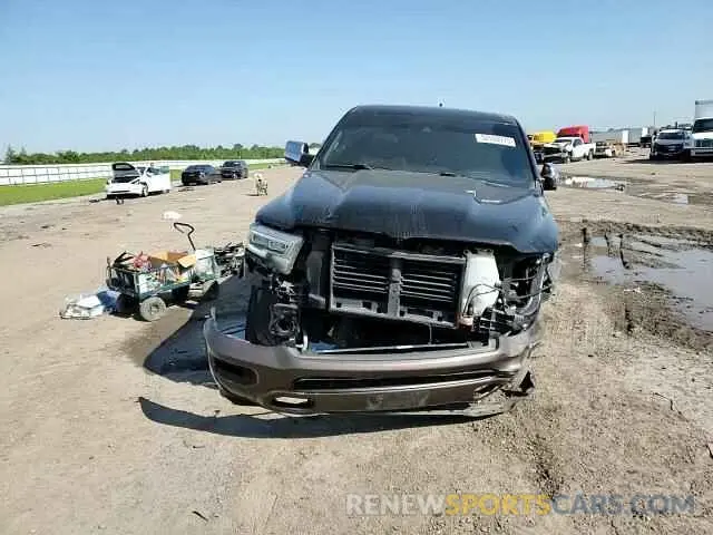 11 Photograph of a damaged car 1C6SRFKT9MN566487 RAM 1500 2021
