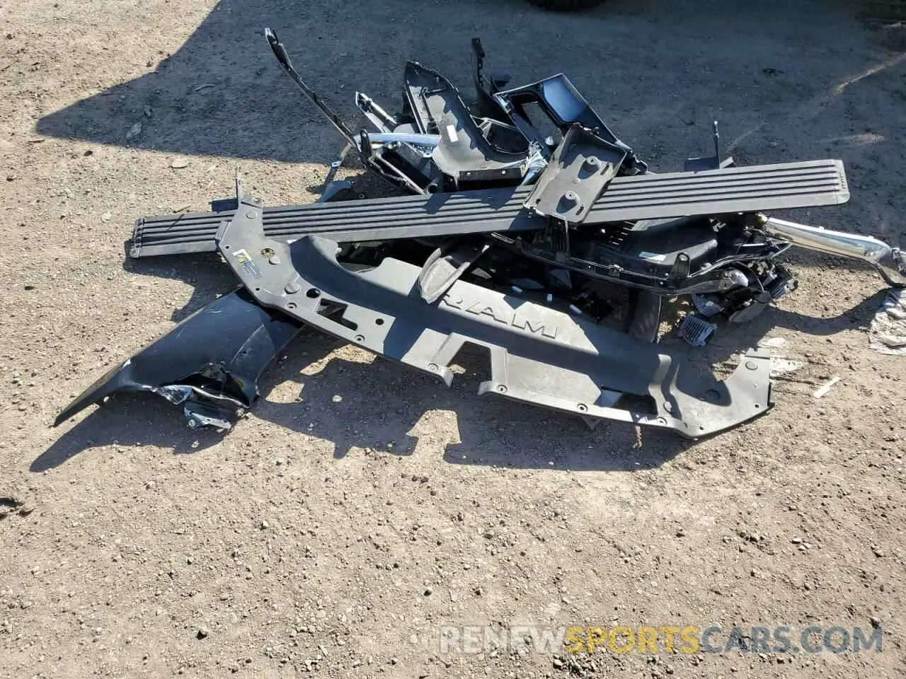 14 Photograph of a damaged car 1C6SRFKT9MN566487 RAM 1500 2021