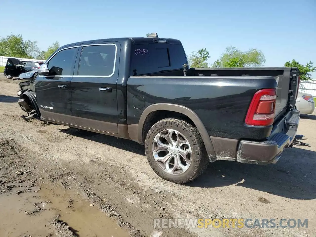 2 Photograph of a damaged car 1C6SRFKT9MN566487 RAM 1500 2021