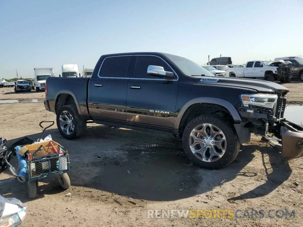 4 Photograph of a damaged car 1C6SRFKT9MN566487 RAM 1500 2021