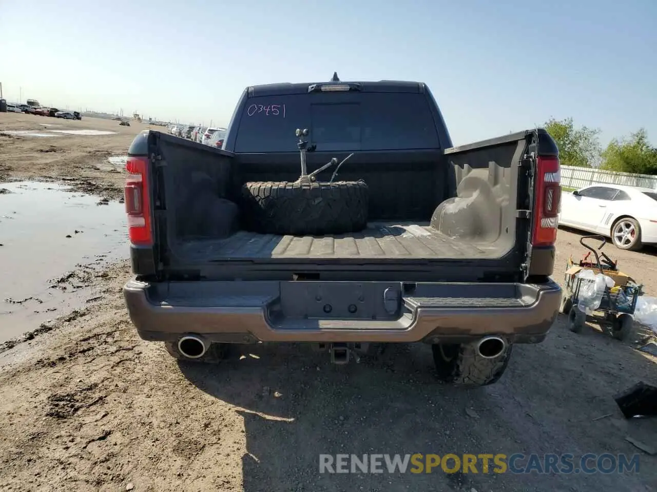 6 Photograph of a damaged car 1C6SRFKT9MN566487 RAM 1500 2021