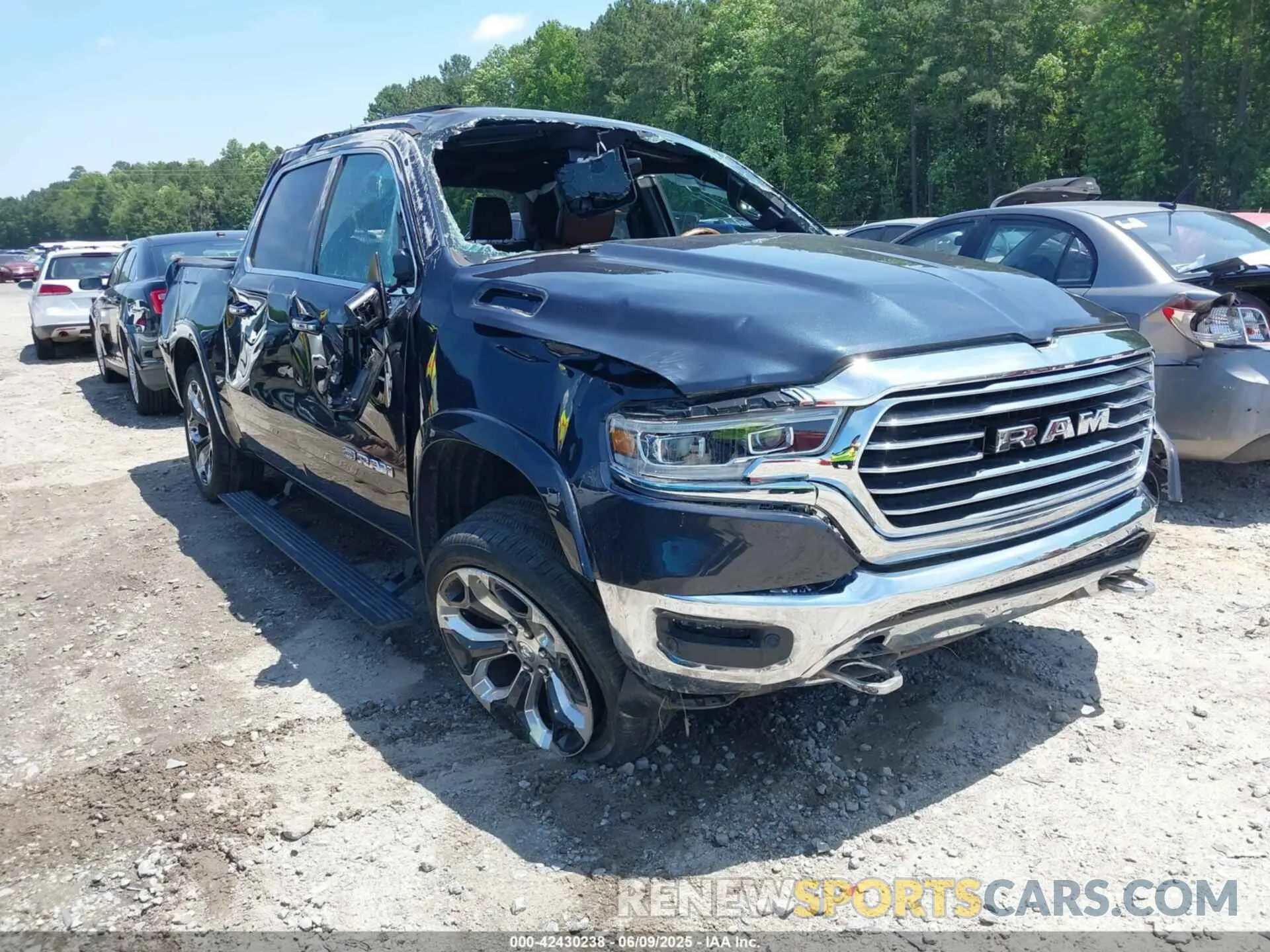 1 Photograph of a damaged car 1C6SRFKTXMN561573 RAM 1500 2021
