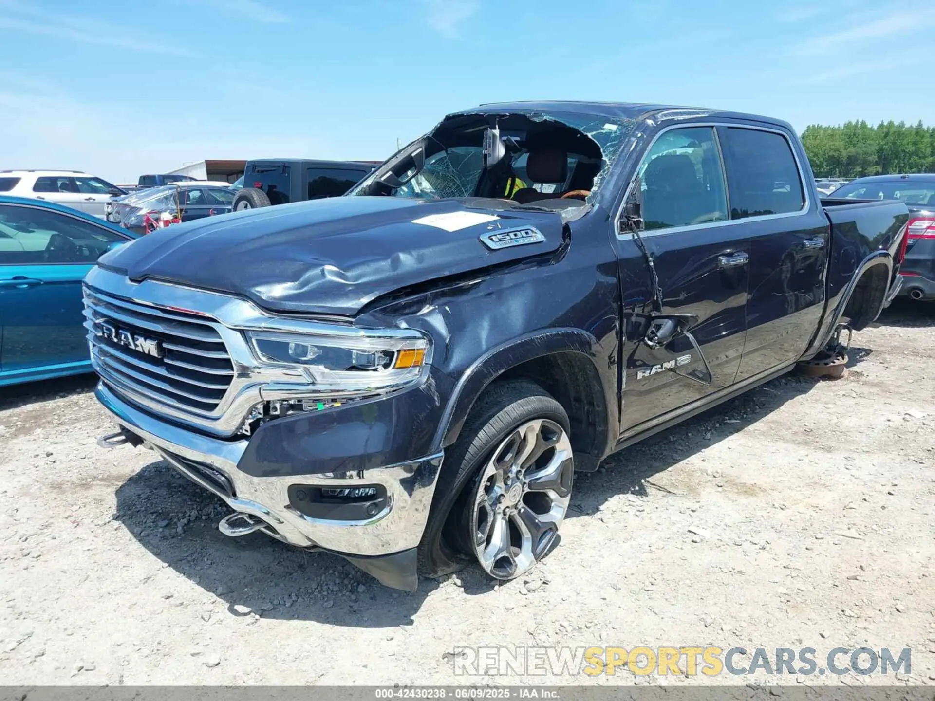 2 Photograph of a damaged car 1C6SRFKTXMN561573 RAM 1500 2021