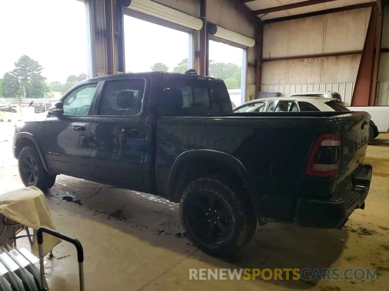 2 Photograph of a damaged car 1C6SRFLM0MN746027 RAM 1500 2021