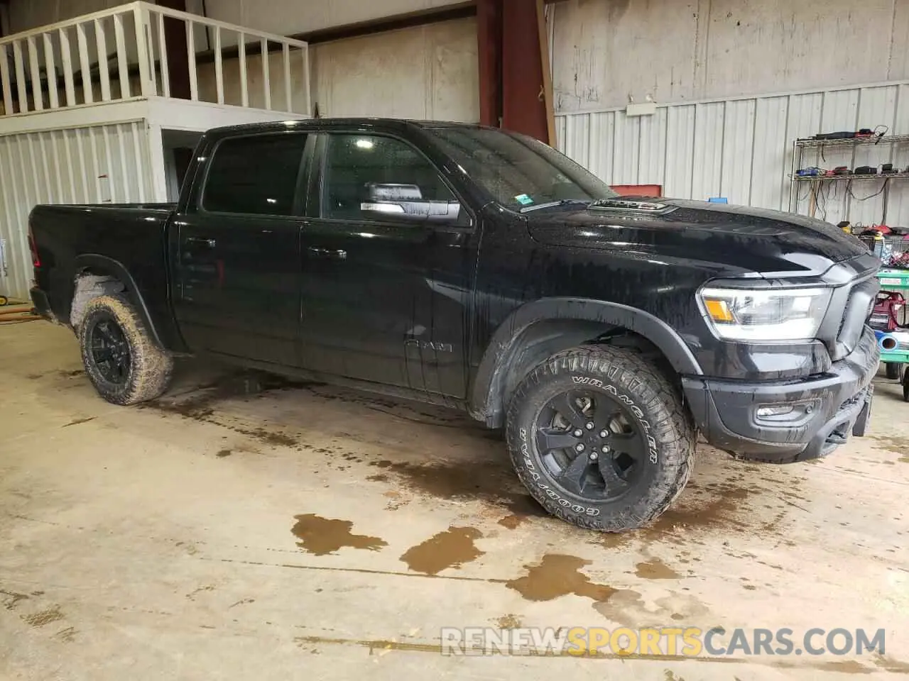4 Photograph of a damaged car 1C6SRFLM0MN746027 RAM 1500 2021