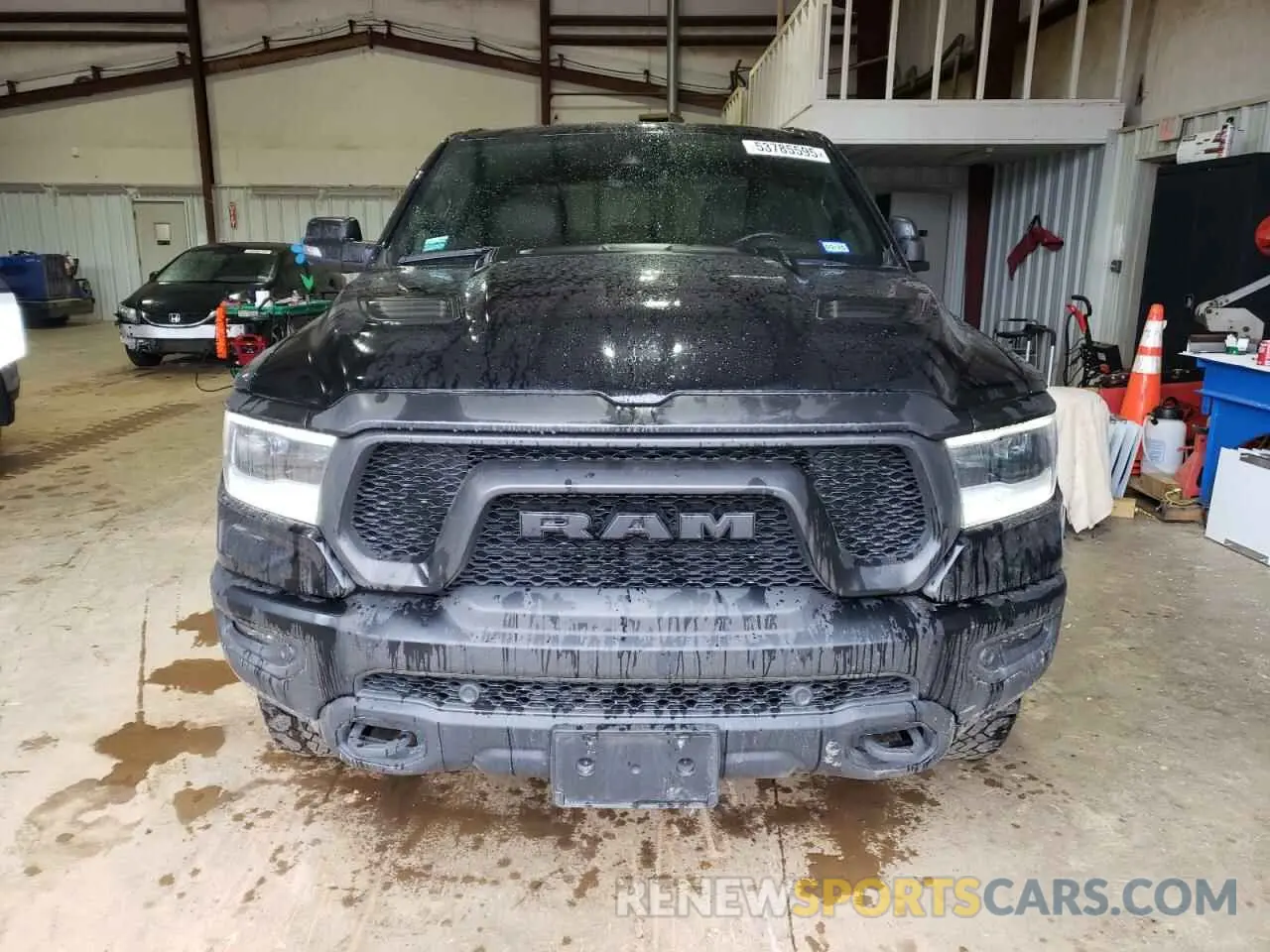 5 Photograph of a damaged car 1C6SRFLM0MN746027 RAM 1500 2021