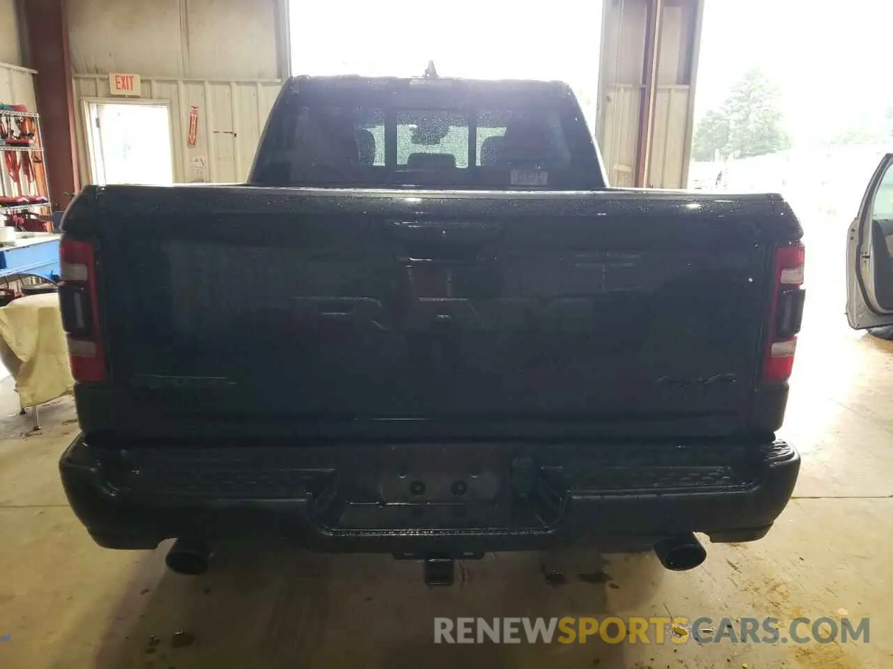 6 Photograph of a damaged car 1C6SRFLM0MN746027 RAM 1500 2021