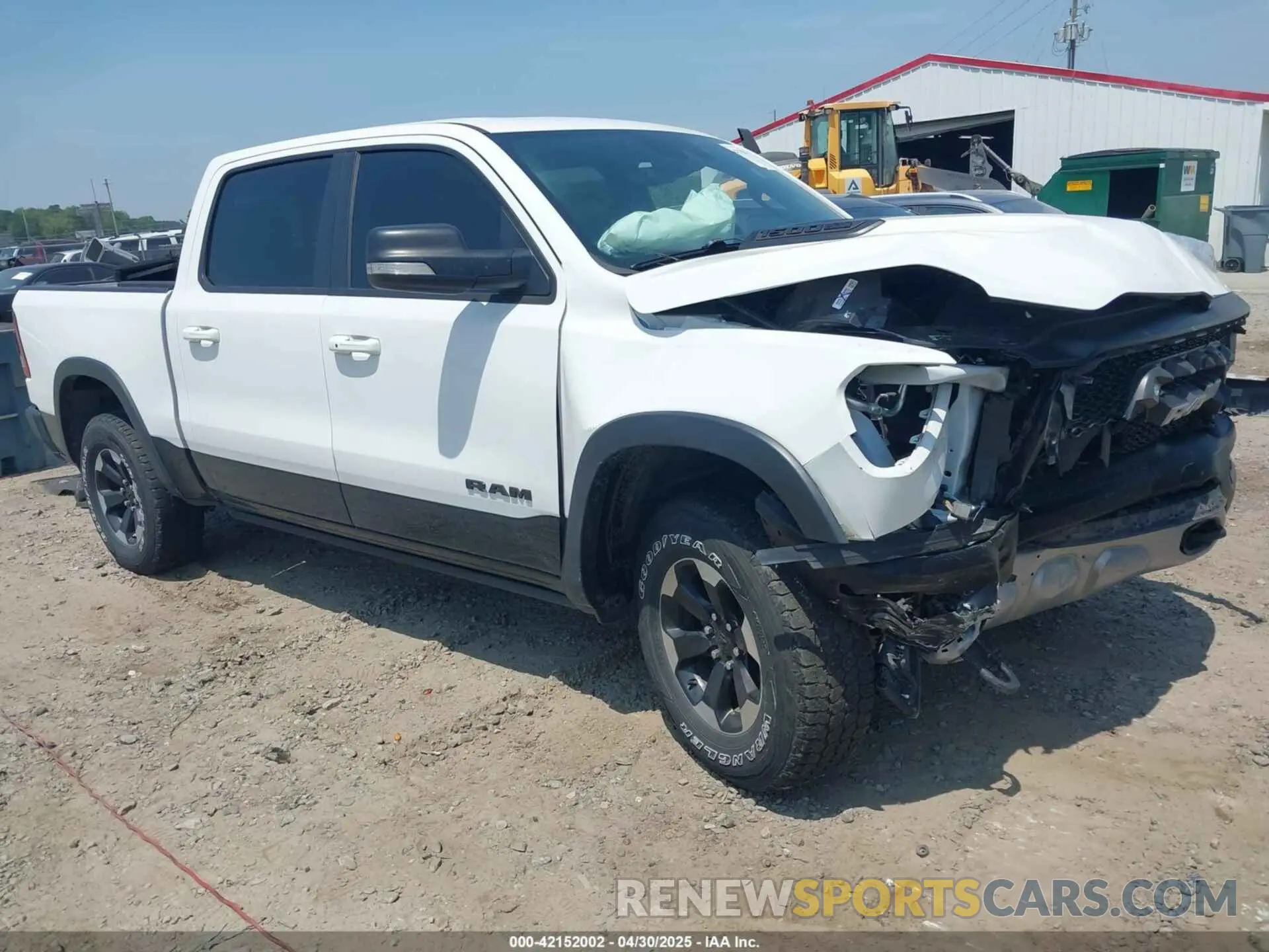 1 Photograph of a damaged car 1C6SRFLT0MN559314 RAM 1500 2021