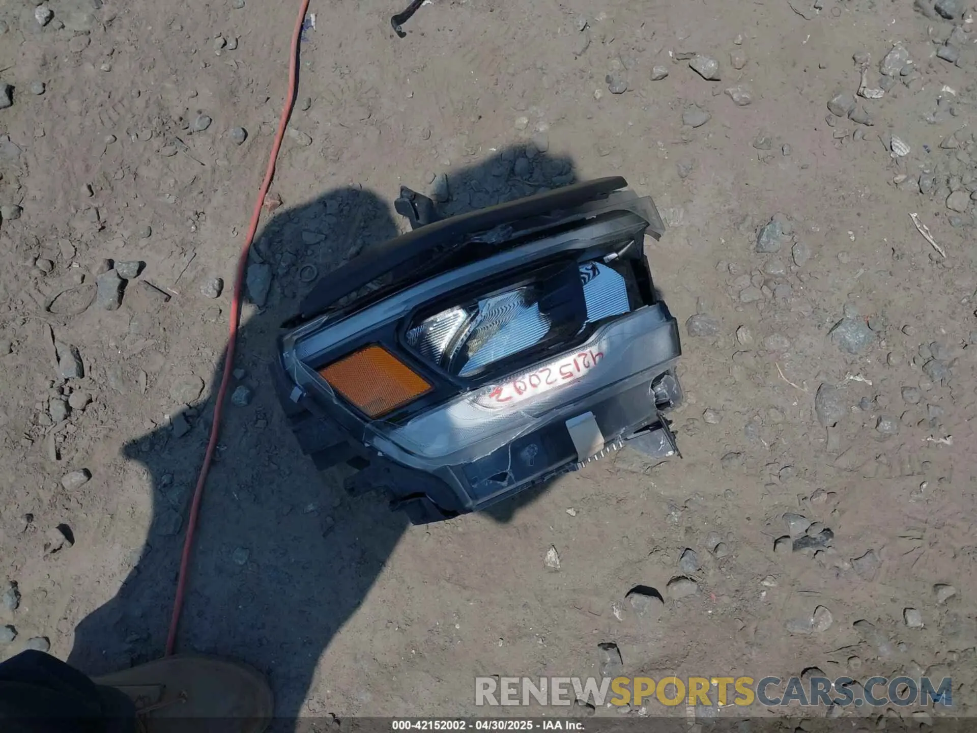 12 Photograph of a damaged car 1C6SRFLT0MN559314 RAM 1500 2021
