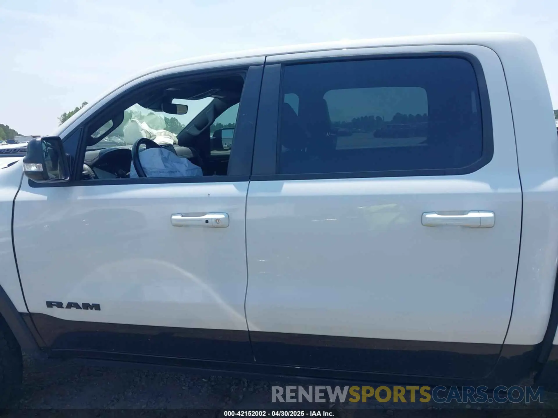 15 Photograph of a damaged car 1C6SRFLT0MN559314 RAM 1500 2021