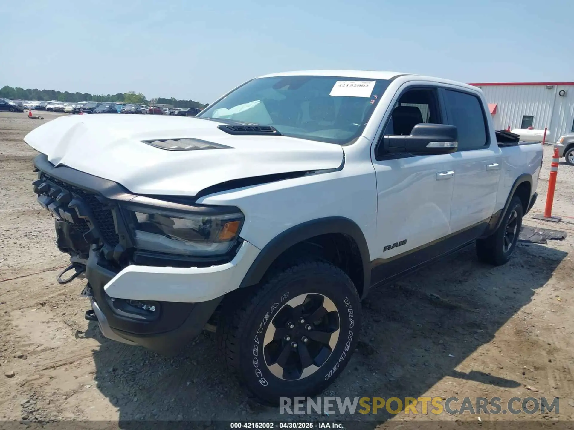 2 Photograph of a damaged car 1C6SRFLT0MN559314 RAM 1500 2021