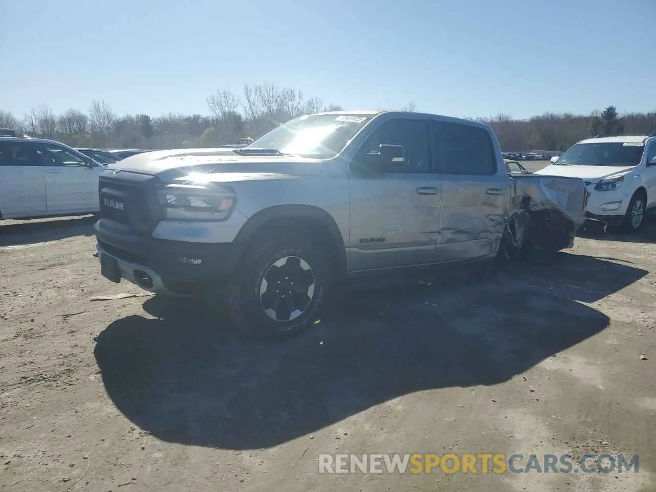 1 Photograph of a damaged car 1C6SRFLT0MN579062 RAM 1500 2021