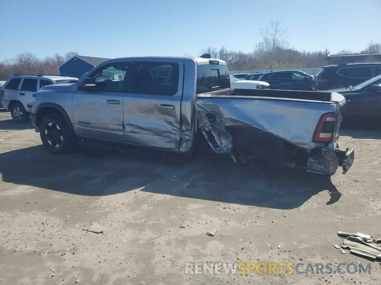 2 Photograph of a damaged car 1C6SRFLT0MN579062 RAM 1500 2021